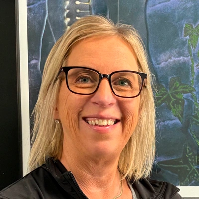 Chiropractic Team Member Headshot With Glasses